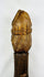 Antique European mortar and pestle featuring intricately detailed pestle