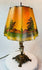Antique French or Dutch Art Nouveau lamp showing pastoral village scenes on parchment shade