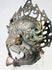Protective bronze ritual mask from the Himalayan region with remnants of pigment and devotional wear
