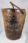 Carved hardwood dairy or provision vessel from Tibet or Nepal with original rope handle