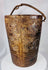 Antique ethnographic wooden container with interwoven carved motifs and darkened aged surface