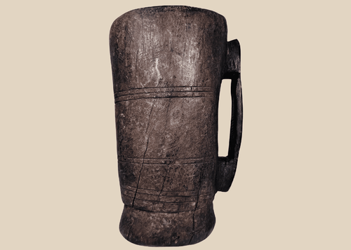 Antique Himalayan hand-carved wooden vessel traditionally used for yak milk or butter storage
