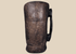 Antique Himalayan hand-carved wooden vessel traditionally used for yak milk or butter storage