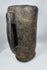 Traditional Tibetan carved wooden butter vessel with shrinkage cracks and hand-worked surface