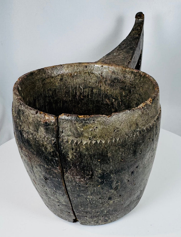 Traditional Himalayan ceremonial scoop-form vessel carved from a single piece of wood