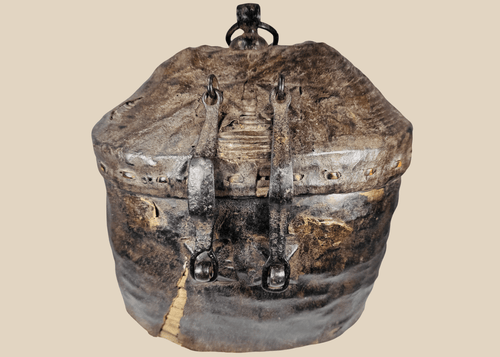 Antique Himalayan woven storage container with leather covering and forged iron hardware