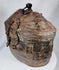 Handwoven Himalayan travel container with aged leather covering and rich patina