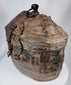Handwoven Himalayan travel container with aged leather covering and rich patina