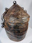 Rare woven reed and hide travel basket displaying traditional indigenous craftsmanship