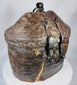 Traditional Tibetan travel basket constructed from woven reed, hide, and iron fittings
