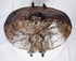 Antique ethnographic basket featuring leather reinforcement and hand-forged iron fasteners