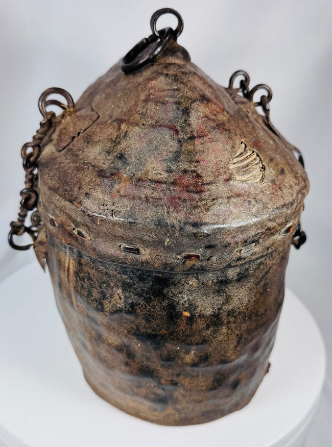 Himalayan ethnographic container with woven basketry interior and leather-covered exterior