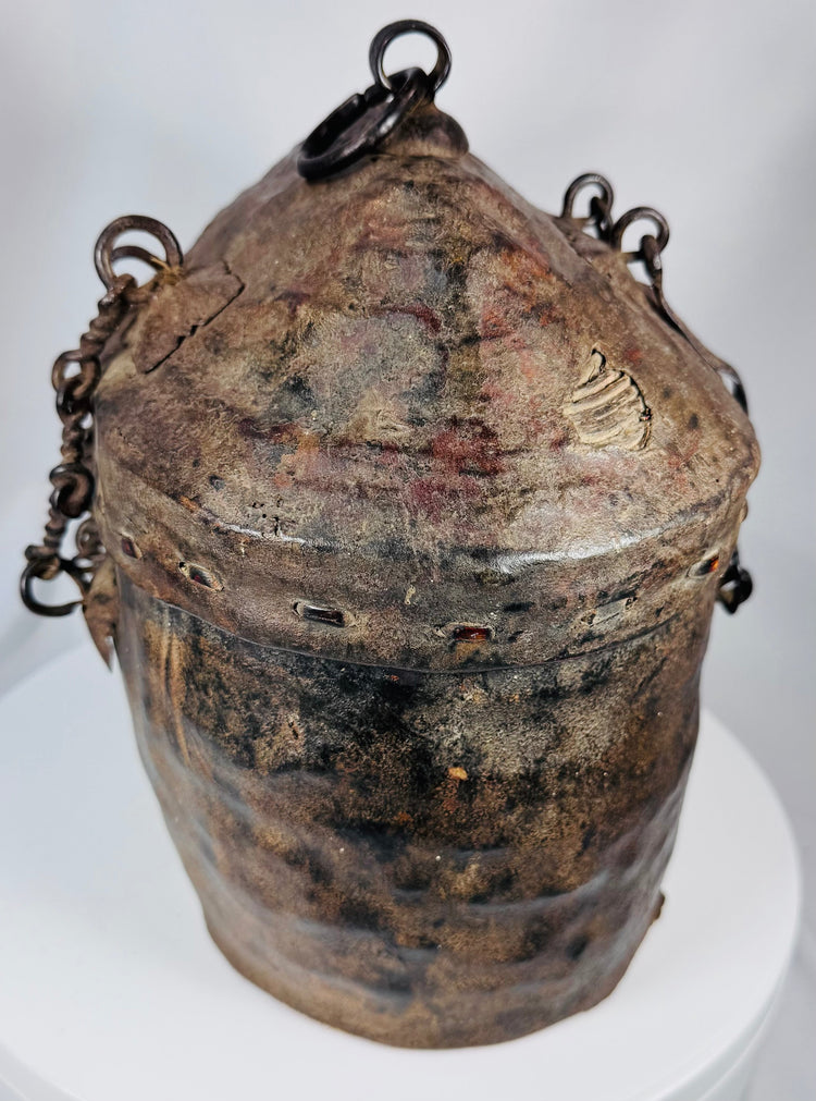 Himalayan ethnographic container with woven basketry interior and leather-covered exterior
