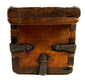 Antique Himalayan storage box with heavy hand-forged iron reinforcements, aged timber, and decorative metalwork.