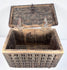 Open Indian brass-clad box revealing the spacious hardwood interior and underside of the decorated hinged lid.