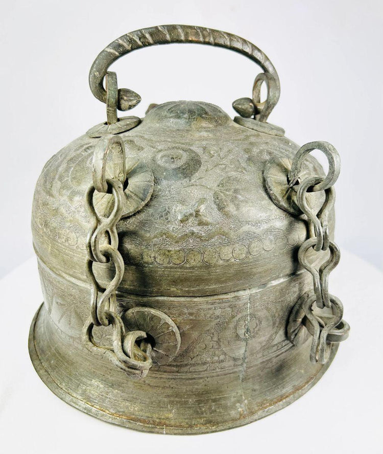 Rear view of a late 18th–early 19th century Indian copper Paan Daan with hand-forged handle and naturally aged surface.
