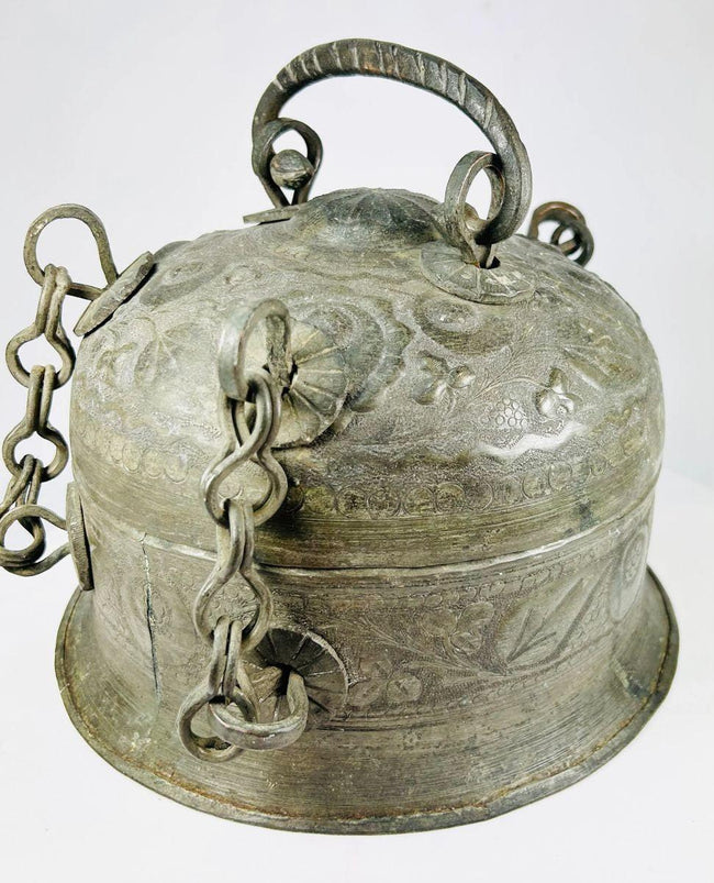 Underside and base detail of an antique Indian copper Paan Daan showing hand-crafted construction and aged patina.