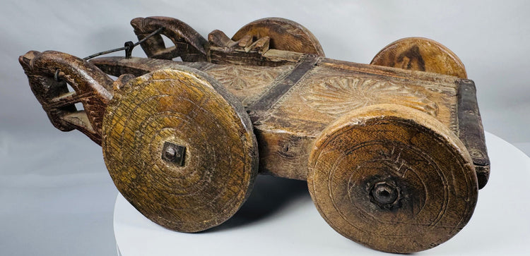 Rustic Indian folk art cart with deeply carved geometric ornamentation