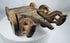 Antique wooden temple-style cart with stylized animal terminals and iron accents