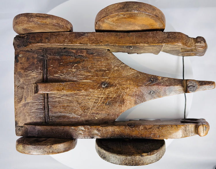 Antique ceremonial wooden cart displaying traditional South Asian craftsmanship