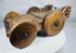 Antique Indian wooden cart with carved rosette motifs and solid wooden wheels