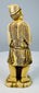 Rear view showing finely incised geometric patterns on the fisherman’s clothing