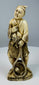 Three-quarter view of an antique Japanese fisherman figure with carved fish and rope