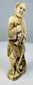 Meiji-period fisherman okimono with crosshatched fish scales and woven fibres