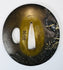 Antique Japanese tsuba signed Eizui with gold and silver inlay and warrior riding a horse through turbulent waves