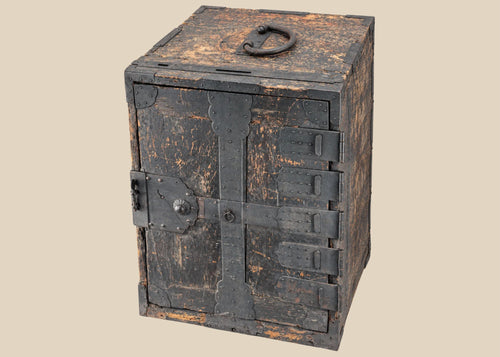 Antique Japanese Edo period funa tansu ship chest circa 1780 with black kiri wood body and extensive hand-forged iron fittings