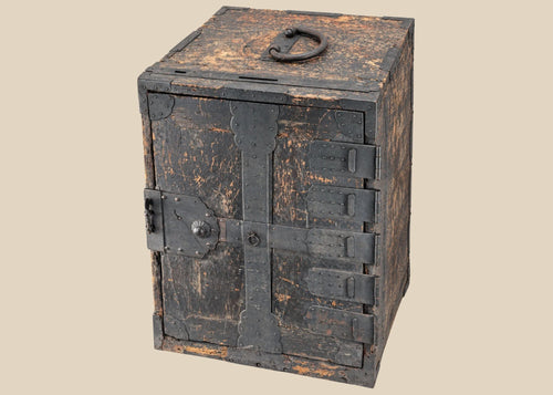 Antique Japanese Edo period funa tansu ship chest circa 1780 with black kiri wood body and extensive hand-forged iron fittings