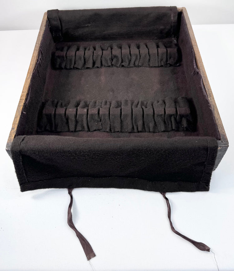 Later silver-storage drawer from antique Japanese funa tansu fitted with dark anti-tarnish textile and individual utensil loops