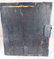 Side view of antique funa tansu displaying iron reinforcement bands, aged wood surface and maritime chest construction