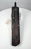 Angled view of Meiji period Japanese gunpowder flask showing dark patinated metal fittings and textured body