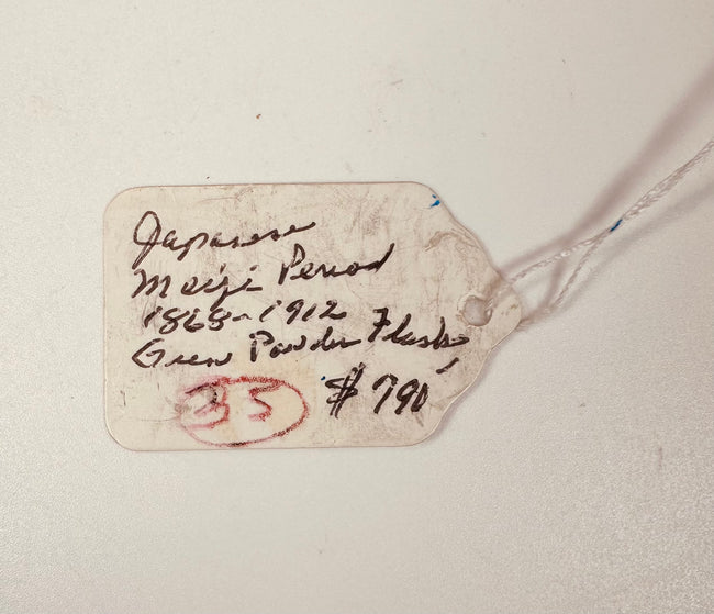 Original handwritten collector tag identifying the Japanese Meiji period 1868–1912 gunpowder flask with former price notation