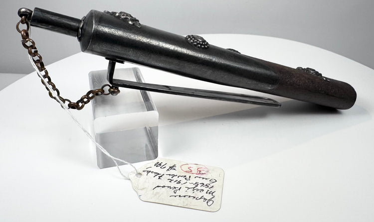Reverse view of Japanese Meiji gunpowder flask showing long metal belt clip and narrow scabbard-shaped body