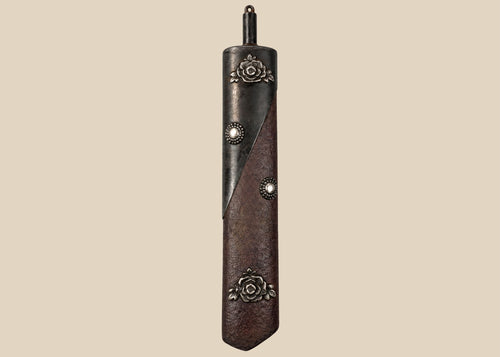 Antique Japanese Meiji period gunpowder flask with floral mixed-metal decoration, securing chain and original collector tag