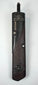 Japanese kayaku-ire gunpowder flask circa 1868–1912 with textured reddish-brown body and silver-coloured floral fittings