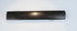 Reverse of the patinated Japanese kozuka handle with a plain darkened surface