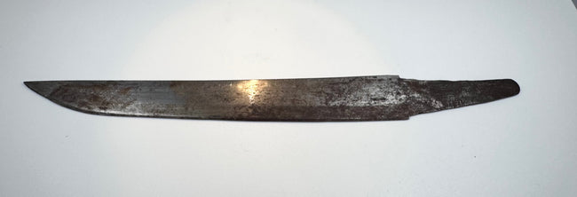 Close view of the single-edged steel kogatana blade with aged oxidation and pitting