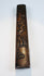 Detailed view of the kozuka showing Zen figures, bamboo and landscape decoration