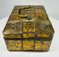 Early 1800s Eastern European jewelry casket with iron straps, riveted construction, and decorative gilt metal panel covering.