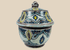 Antique Moroccan hand-painted pottery jar with fitted lid and floral decoration