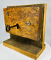 Historical mortise lock with skeleton key and aged patina on wood housing