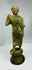 Neoclassical bronze sculpture with contrapposto stance and drapery