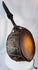 Himalayan shaman's drum from Nepal displaying extensive rawhide bindings and traditional ceremonial craftsmanship.