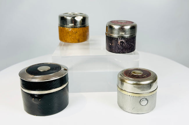 19th century portable ink bottles with nickel-plated hardware and lids