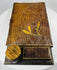 Antique lap desk with interior compartments and glass inkwell reservoir