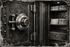 Display mounted antique safe lock showcasing early mechanical engineering