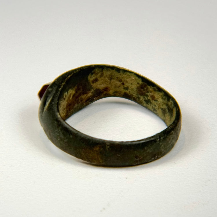 Profile of Sassanian silver ring highlighting the carnelian intaglio setting and natural surface wear